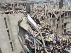 Haiti - Social : Martelly shares the pain of Bangladesh