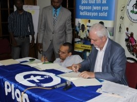 iciHaïti - Politique : Signature d'un protocole d'accord avec Plan International Haïti 