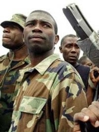 Haiti - Security : The BAC wants a warrant against Guy Philippe