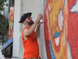 iciHaiti - Culture : Canadian and Haitian graffiti artists create a mural, front the Best Western Hotel