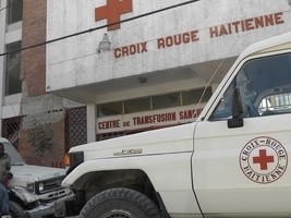 iciHaiti - Security : An ambulance of the Red Cross under the bullets