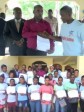 iciHaiti - Politics : Distribution of 84 checks of 100,000 Gourdes