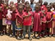 iciHaïti - Social : Distribution de «Bobs Shoes» à 120 élèves de Panyol 