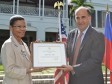 Haiti - Social : Florence Élie receives the award 