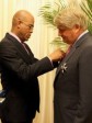 Haiti - Social : The Chairman of Digicel, decorated by the President Martelly