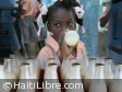Haiti - Education : Sophia Martelly distributes milk in schools